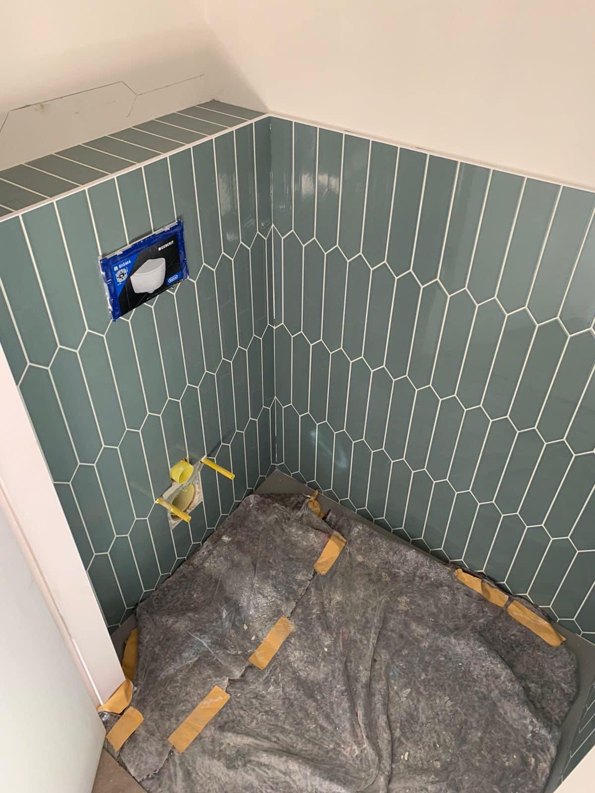 Motieftegels toiletruimte — Putten